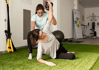 a woman receiving musculoskeletal physiotherapy